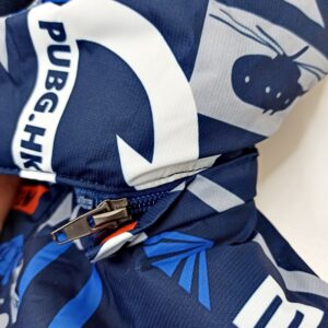 zieminis-rudeniui-kombinezonas-berniukui-pilka-oranzine-viduje-flanele-su-kapisonu-neperpuciamas-neperlijamas-kapisonas-nusisega-drugeliukai.lt